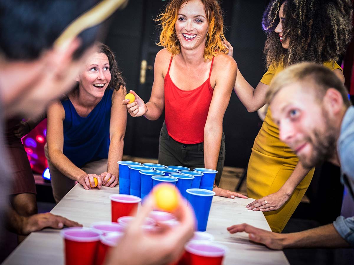 Playing Beer Pong with Adult Friends Outdoor Activities Reduced